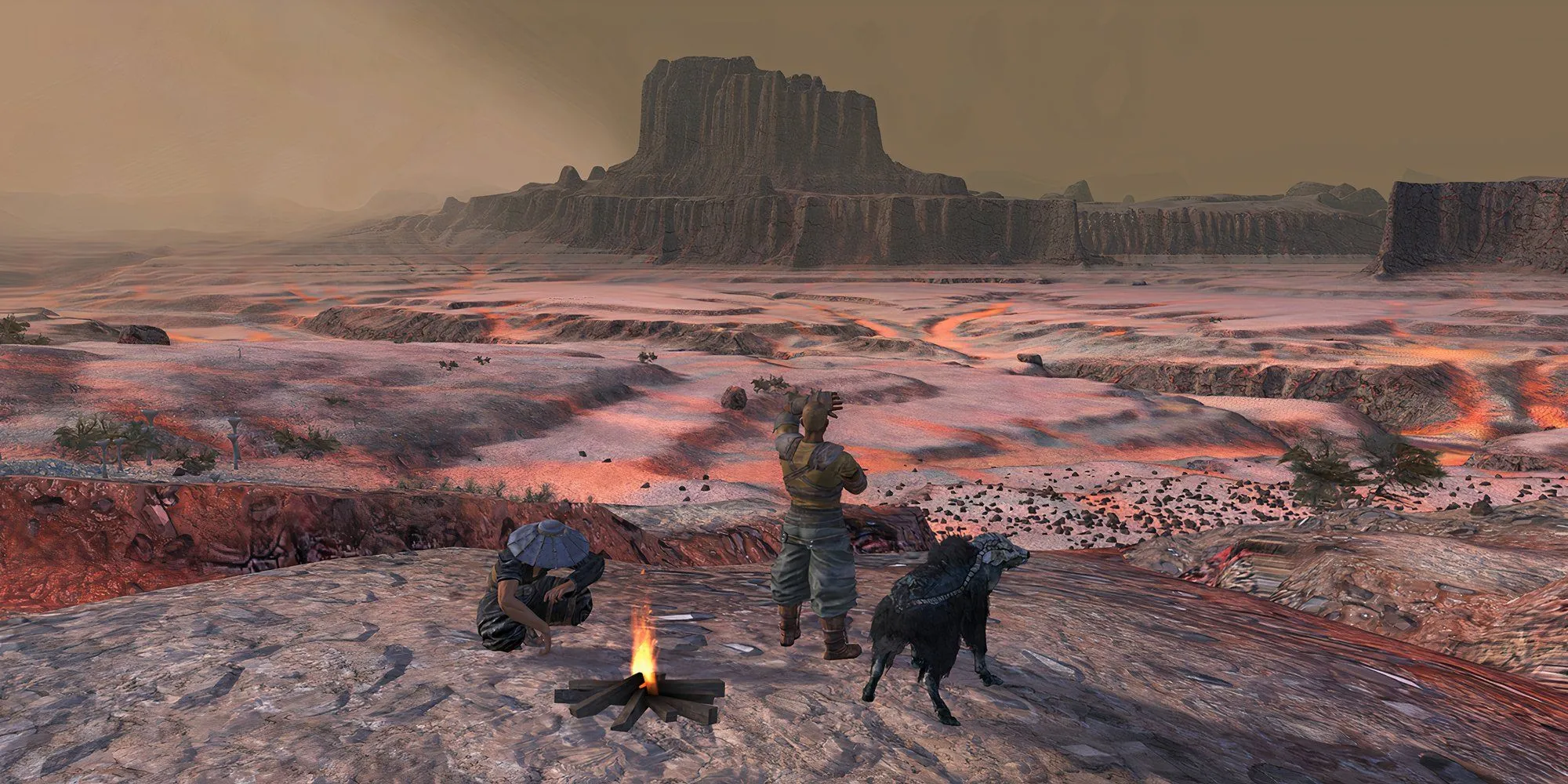 Ảnh chụp màn hình nhiều nhân vật từ game Kenshi trên một vùng đồi núi hoang tàn