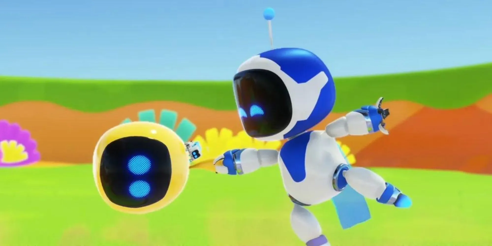 Astro Bot di chuyển trong một màn chơi nhiều màu sắc, thể hiện khả năng xử lý đồ họa của PS5