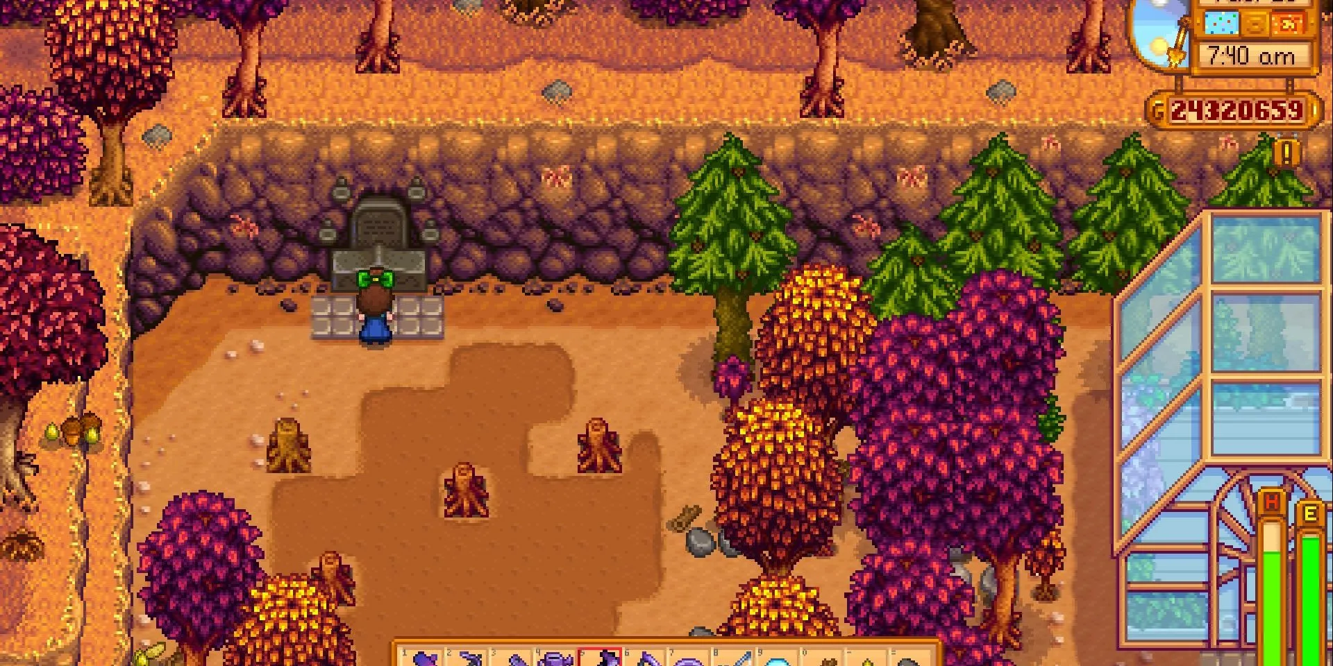 Bàn thờ Ông nội trong Stardew Valley, khu vực bị chặn bởi khúc gỗ lớn.