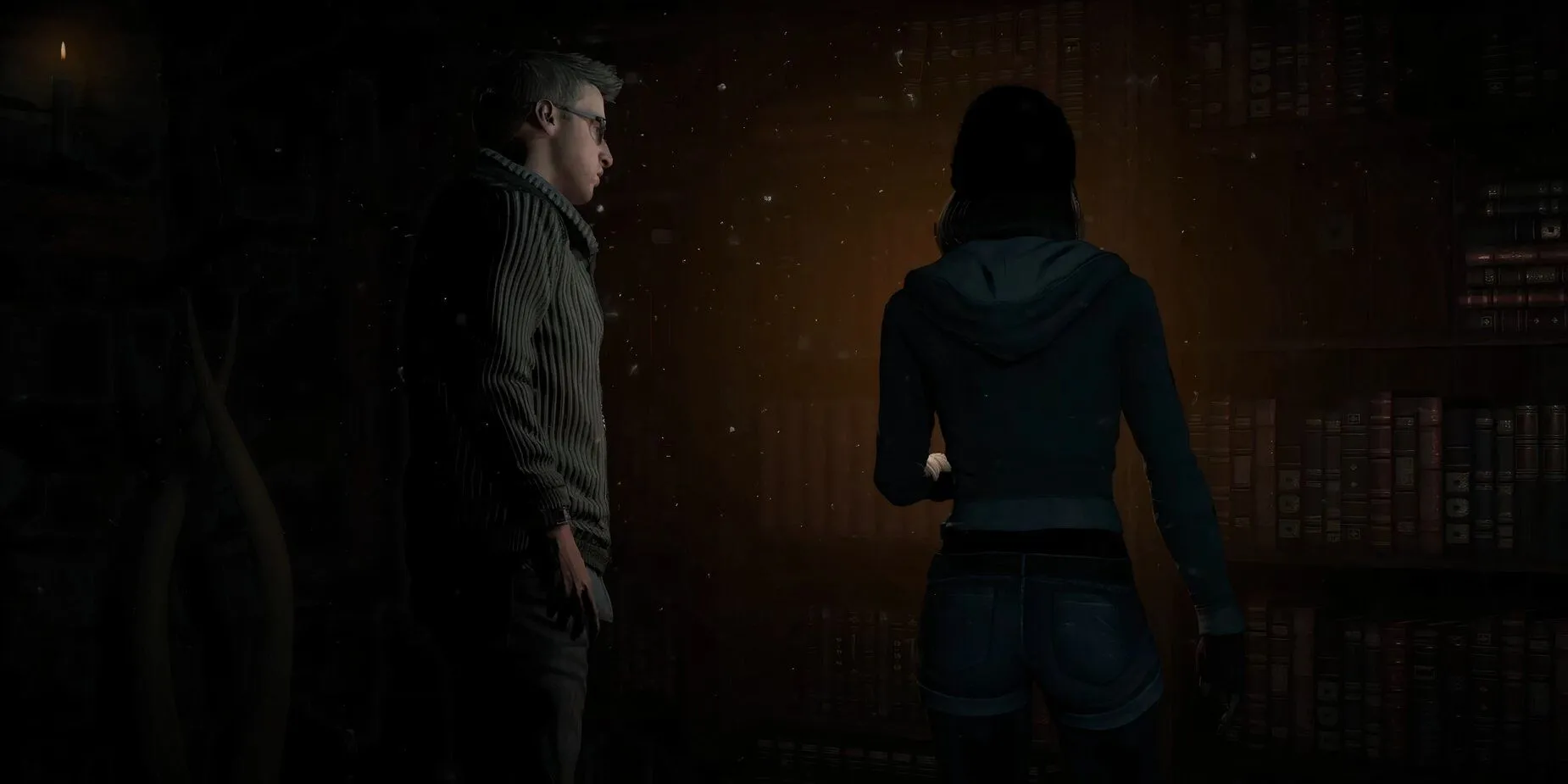 Cảnh các nhân vật Until Dawn tương tác bên cạnh tủ sách trong một phân đoạn gameplay