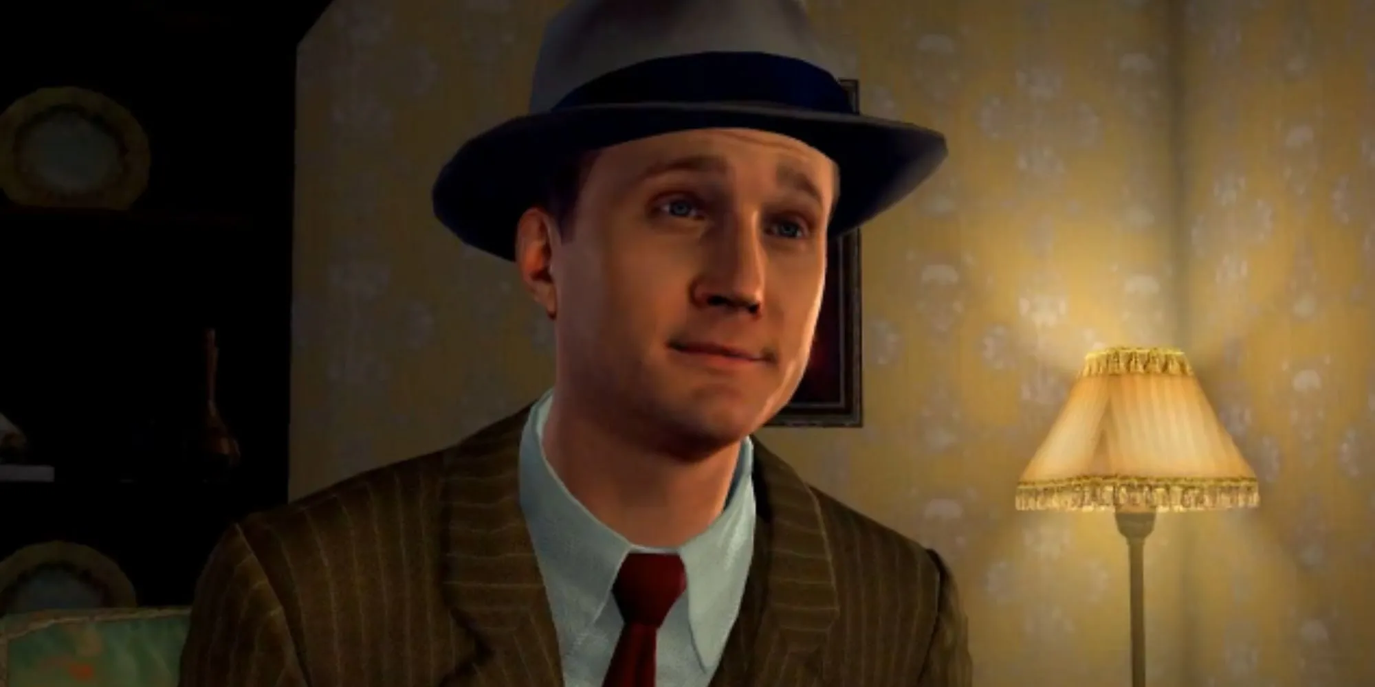 Cole Phelps trong L.A. Noire đang thẩm vấn nghi phạm với vẻ mặt nghiêm túc
