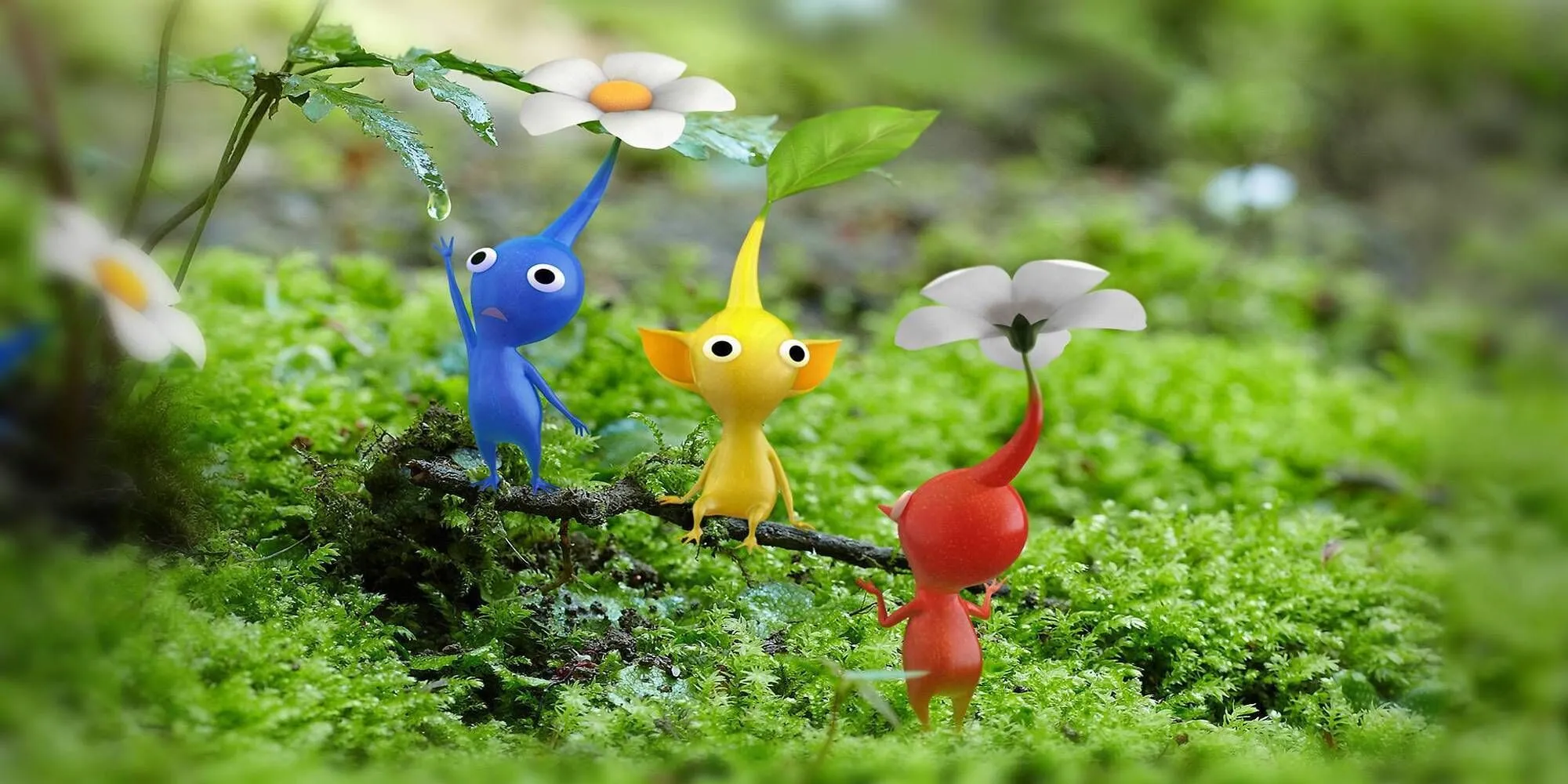 Đàn Pikmin nhiều màu sắc đậu trên cành cây trong Pikmin 3 Deluxe