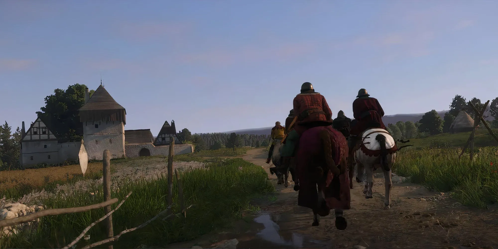 Henry của Skalitz nói chuyện với một nhân vật khác trong Kingdom Come: Deliverance II