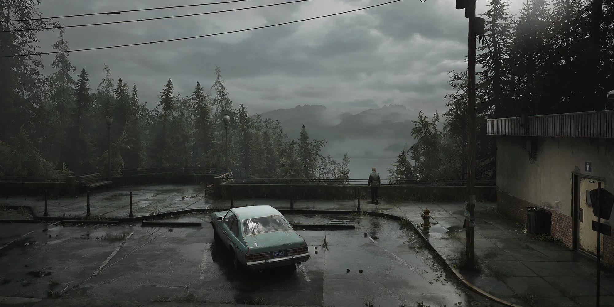 James Sunderland, nhân vật chính của Silent Hill 2, quay lưng lại đứng một mình giữa cảnh vật u ám