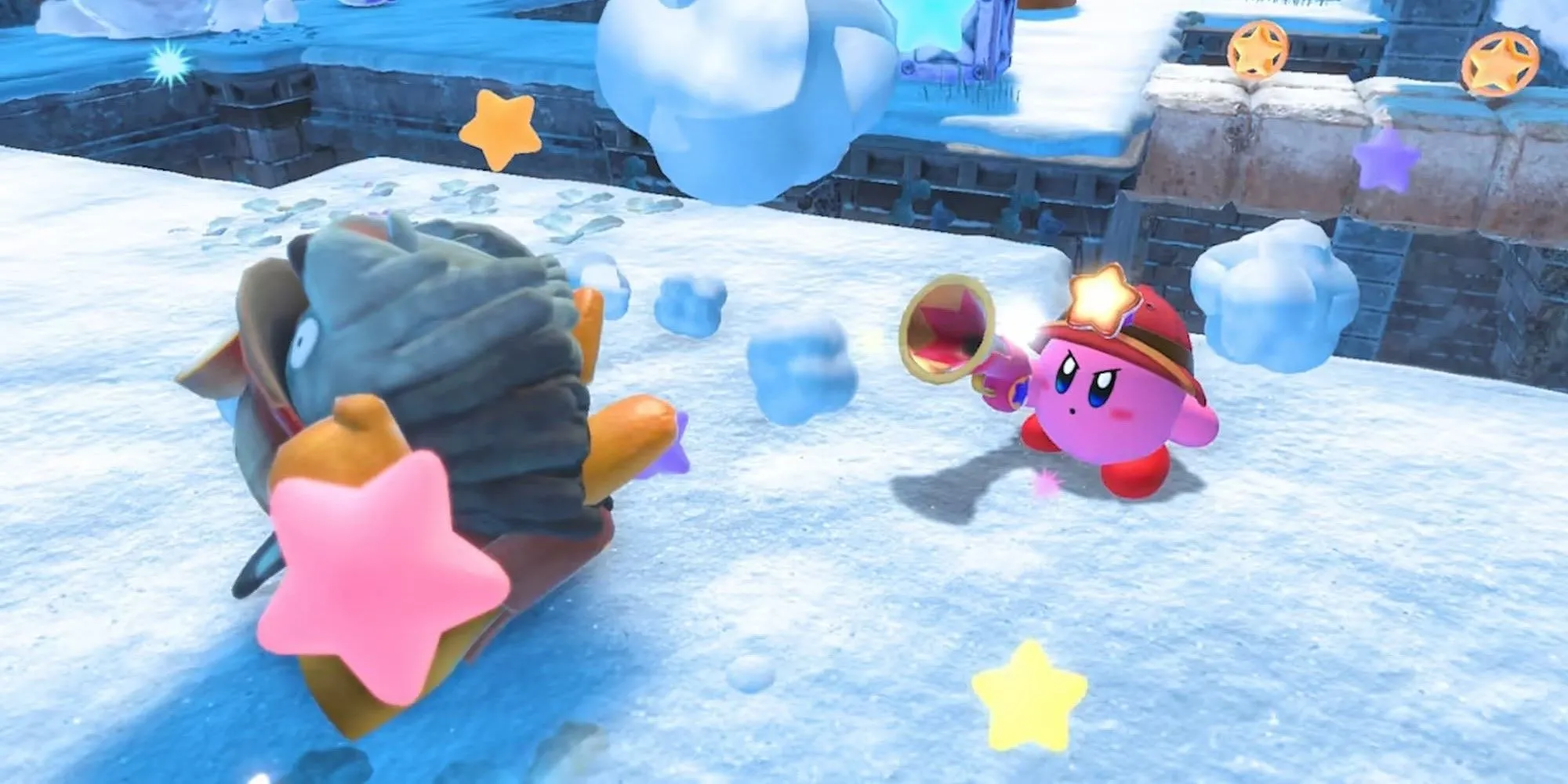 Kirby đồ họa chibi đang sử dụng khả năng chiến đấu trong game platformer Kirby and the Forgotten Land