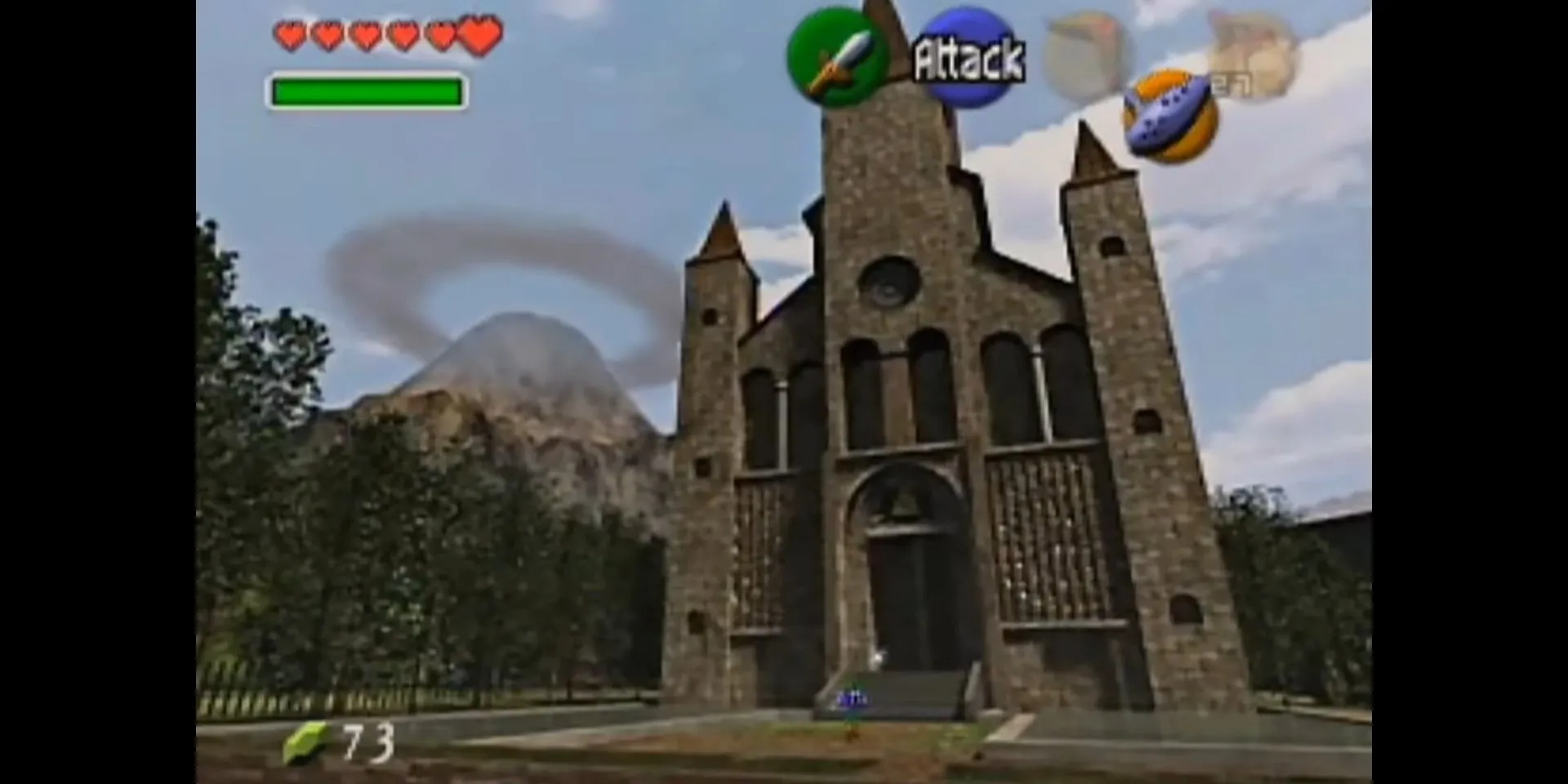 Link đứng trước Đền Thời Gian hùng vĩ trong Ocarina of Time với Núi Tử Thần phía xa