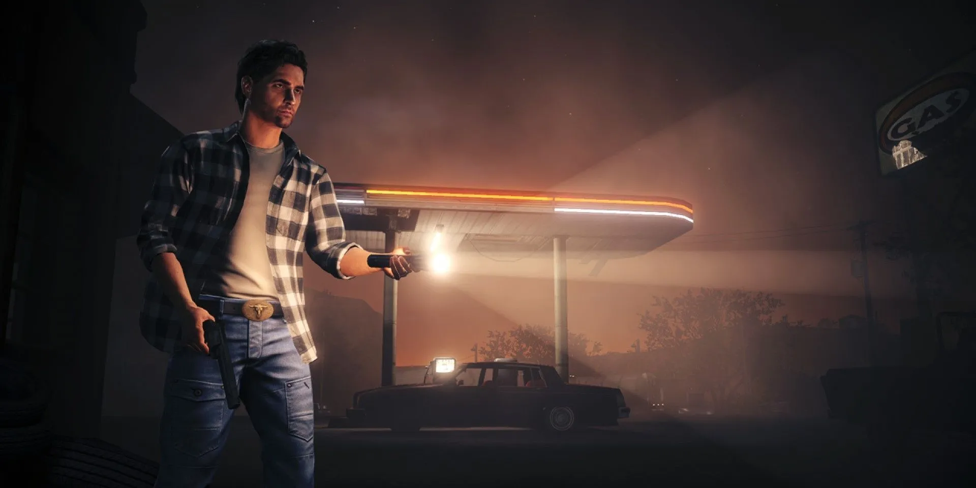 Nhân vật Alan Wake cầm đèn pin trong bóng tối