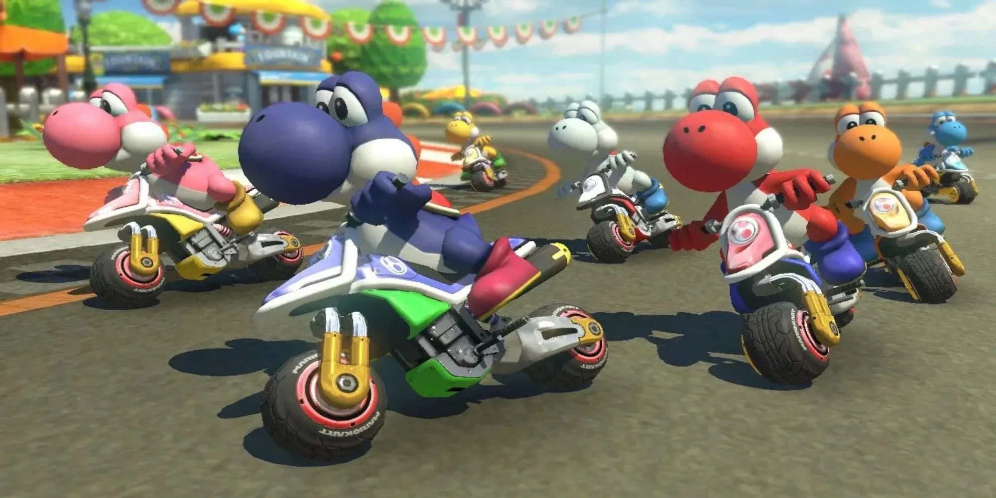 Nhân vật Mario Kart 8 đang drift tăng tốc trên đường đua đầy màu sắc