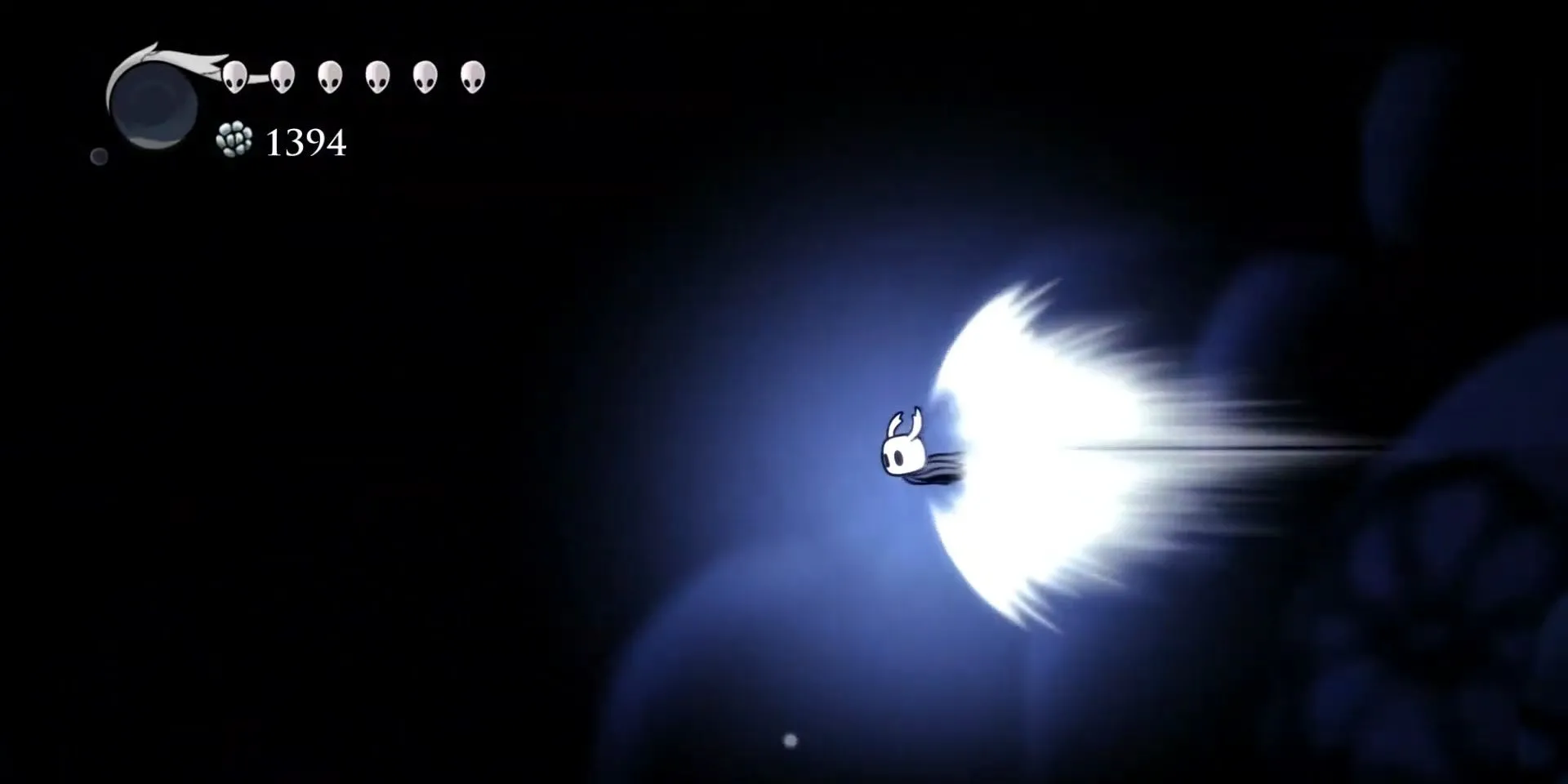 Nhân vật thực hiện Crystal Dash trong Hollow Knight để vượt chướng ngại vật