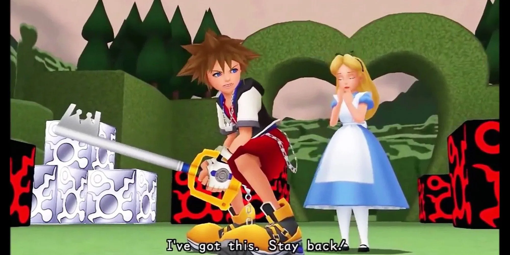 Sora chiến đấu bảo vệ Alice tại thế giới Wonderland trong Kingdom Hearts 1.