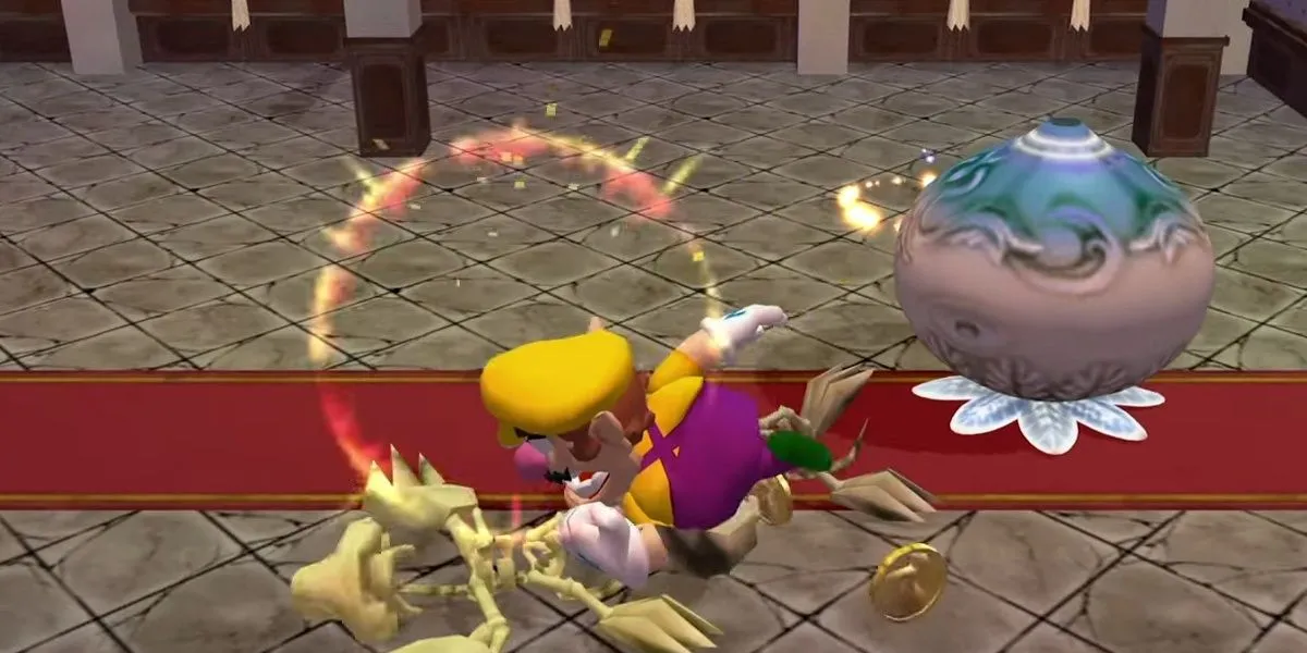 Wario dùng cú húc đầu tấn công kẻ thù trong game Wario World trên GameCube