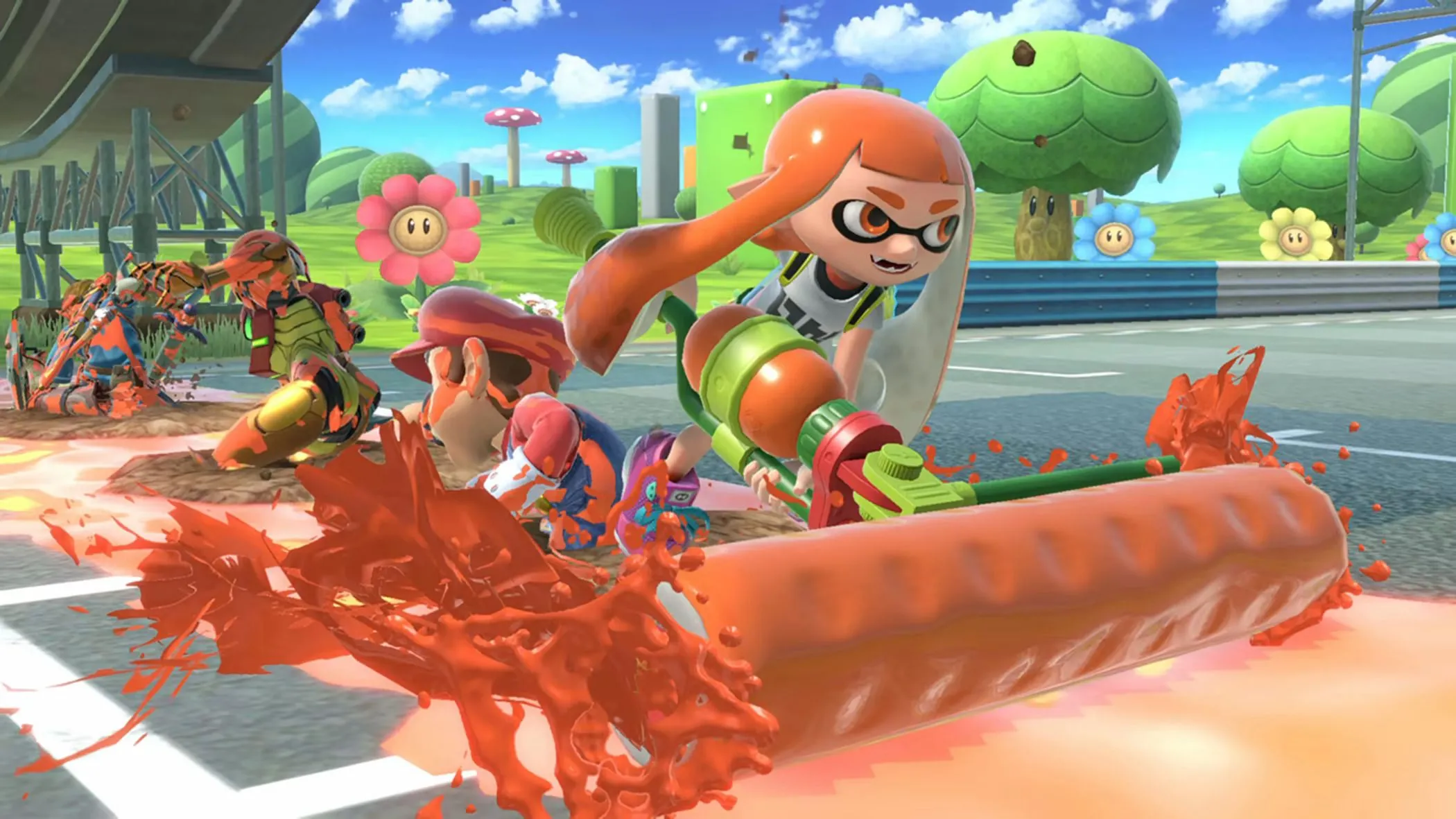 Nữ Inkling sử dụng mực cam tấn công Mario và Samus trong trận đấu Super Smash Bros. Ultimate trên đường đua Mario Kart