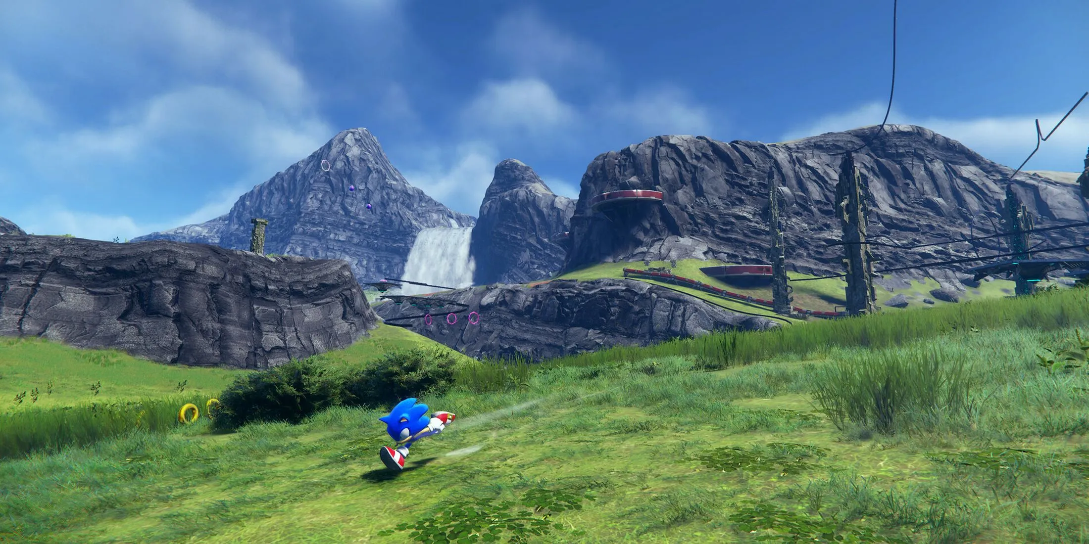 Sonic đang chạy qua một cánh đồng trong game Sonic Frontiers, thể hiện môi trường rộng lớn