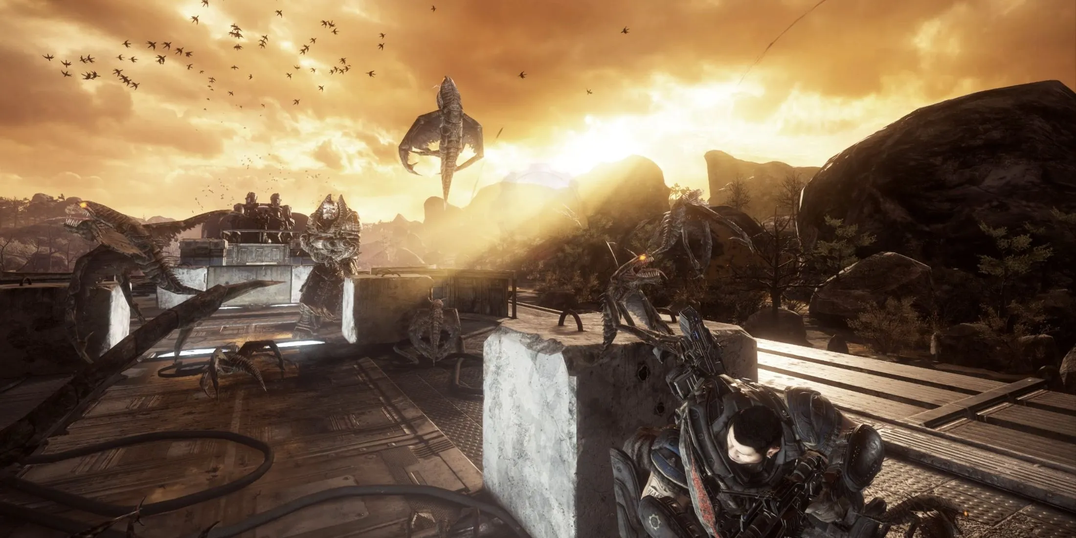 Game thủ trên tháp pháo trong trận chiến trùm Raam của Gears of War: Reloaded, minh họa hành động dữ dội của tựa game bắn súng góc nhìn thứ ba.
